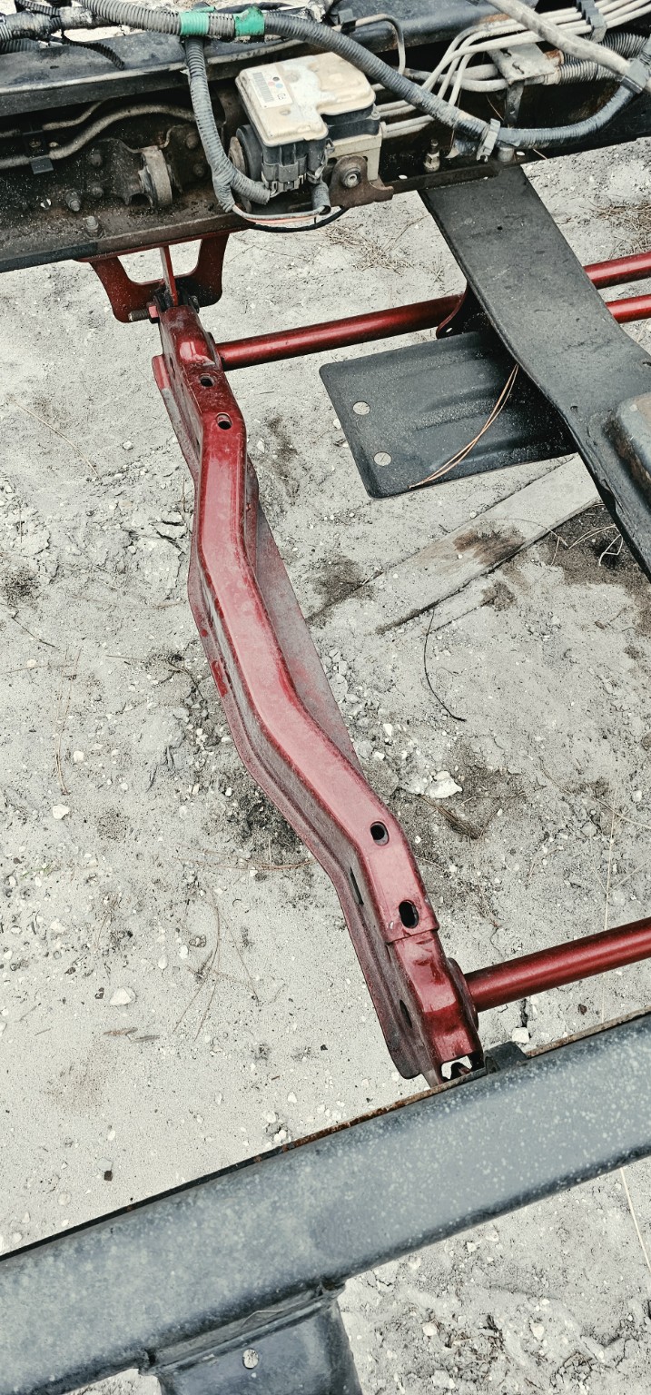 Dropped torsion-bar crossmember
